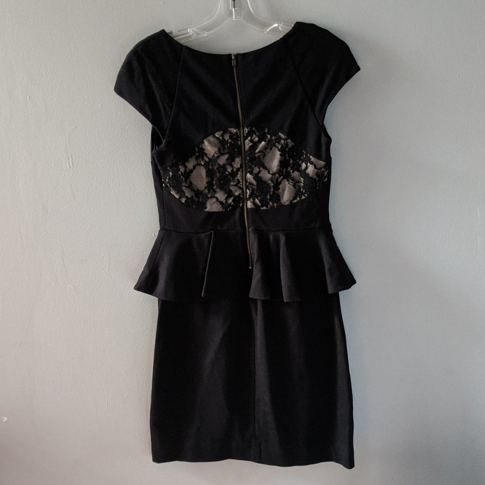 Black peplum dress with lace insert